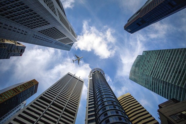 A tall building housing many companies.